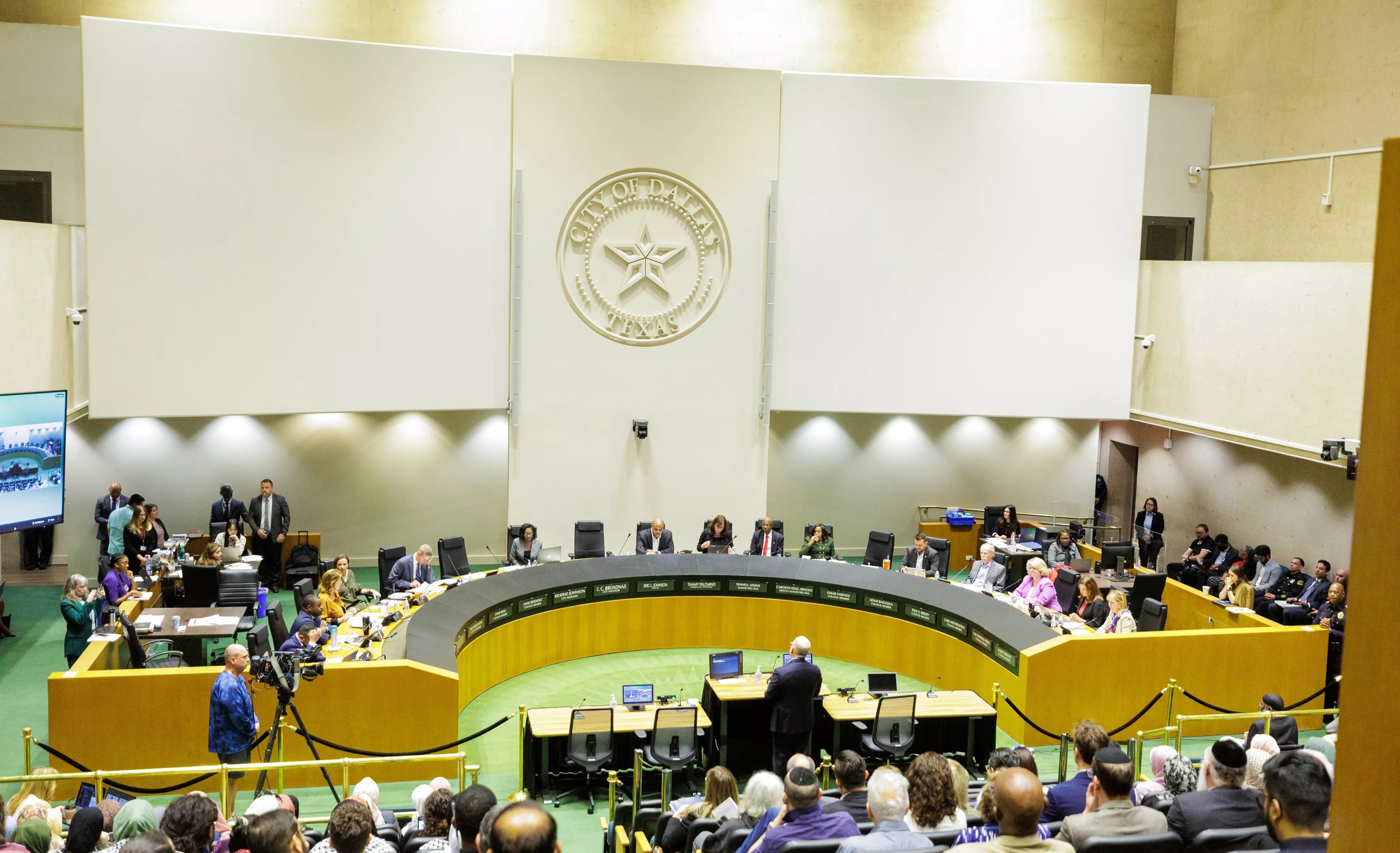 Dallas city council listens to public speakers.