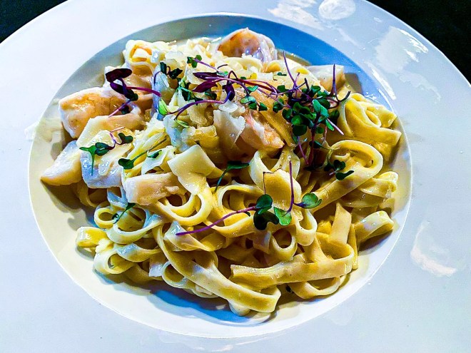 Seafood pasta is stuffed with Diver scallops, Gulf shrimp and fresh Parmesan.