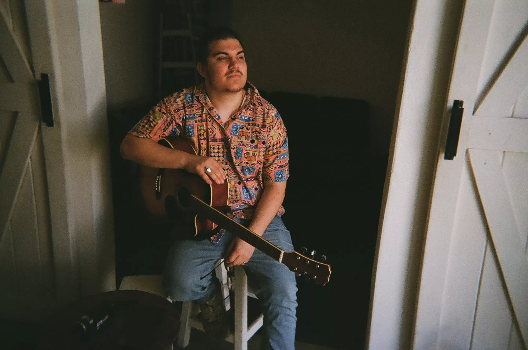 Fort Worth's Julián Cedillo, aka WACHO!, with guitar