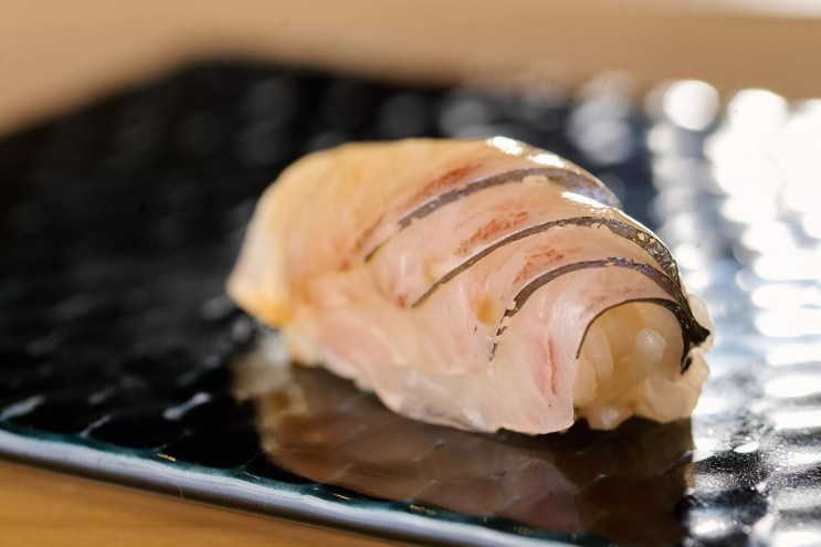 a cut of shima-aji at Tatsu