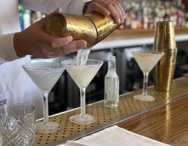 martinis being made at a bar