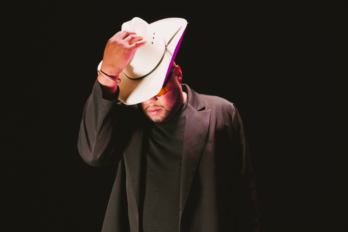 Man with a hat in a suit