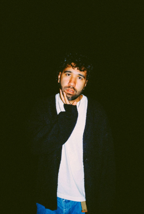 Man standing in the dark.