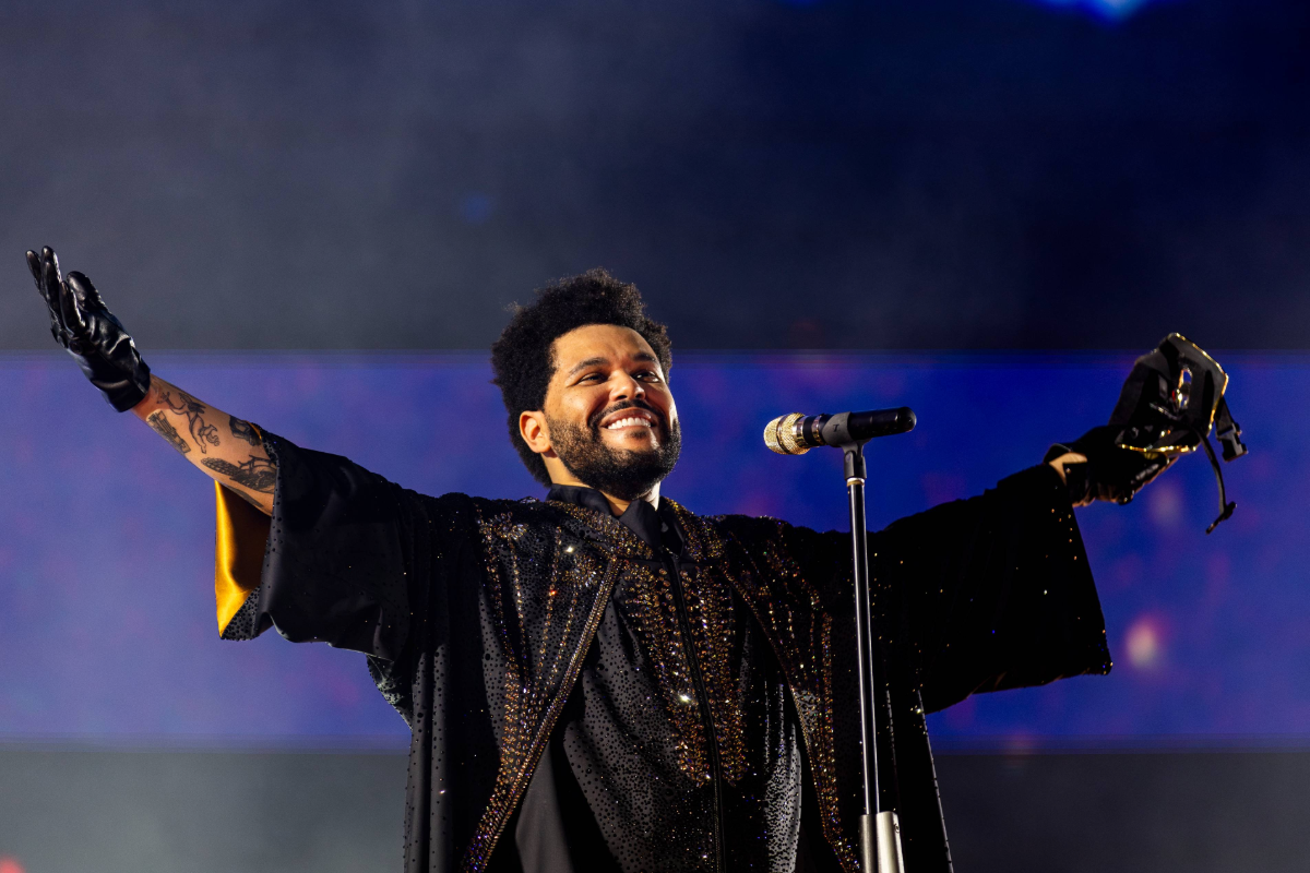 Man on stage performing