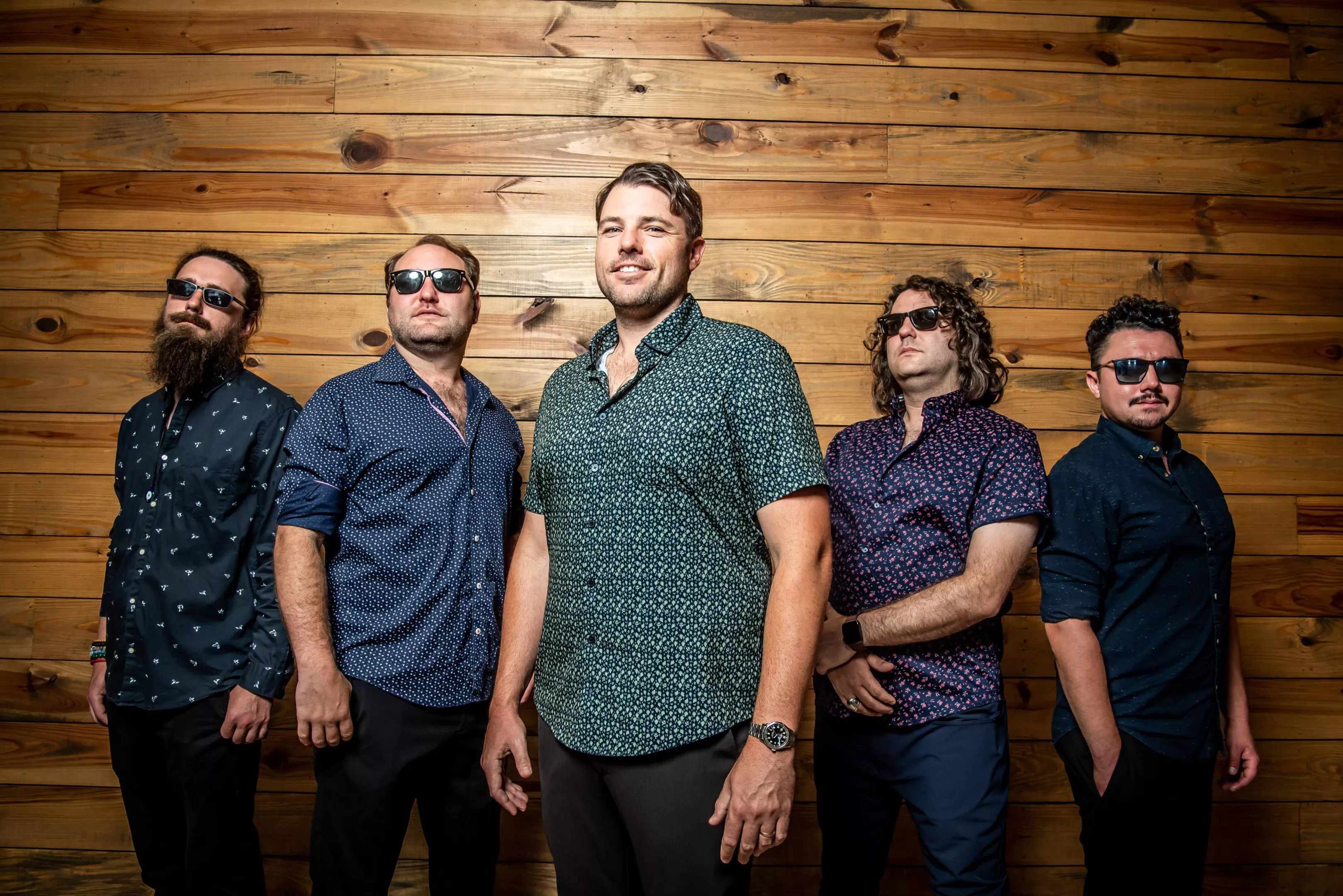 Band is posing for a picture